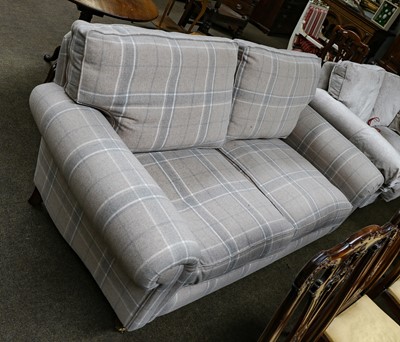 Lot 1146 - A Laura Ashley three-seater scroll arm sofa in...