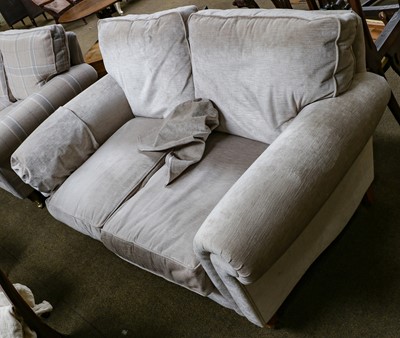 Lot 1147 - A Laura Ashley two-seater scroll arm sofa in...