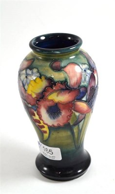 Lot 165 - A William/Walter Moorcroft orchid and spring flowers pattern vase, 18.5cm