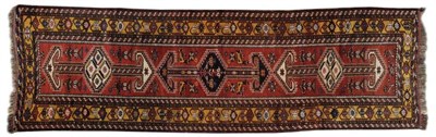 Lot 1114 - Neriz Runner  South Persia The madder field with a column of stepped medallions framed by...