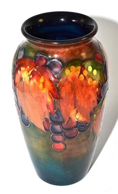 Lot 166 - A William/Walter Moorcroft flambe leaf and berry pattern vase, 19cm (restored rim)
