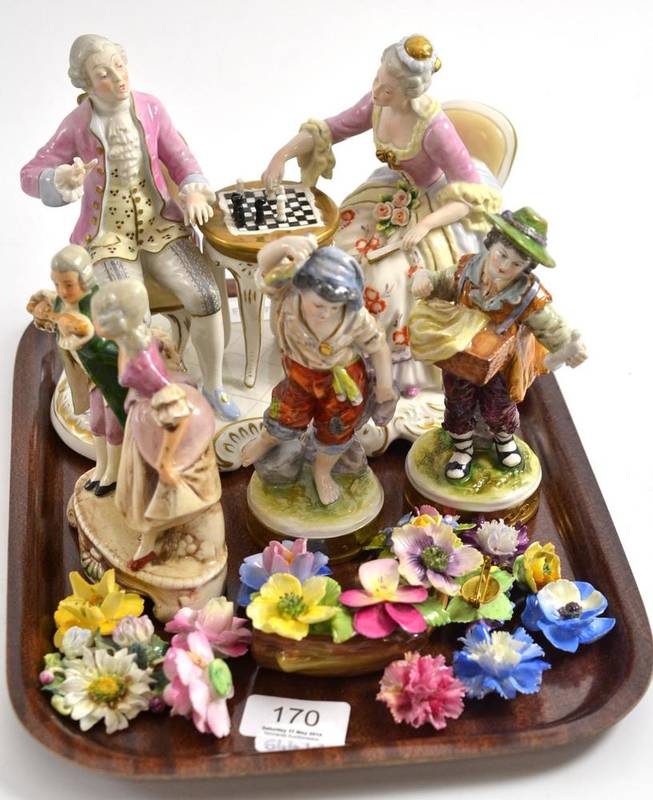 Lot 170 - A Kaiser ceramic group of figures playing chess, three Continental figures and Staffordshire floral
