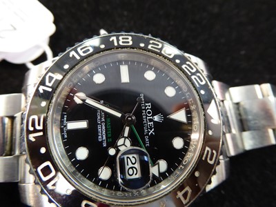 Lot 2186 - Rolex: A Stainless Steel Automatic Calendar Centre Seconds Dual Time Zone Wristwatch