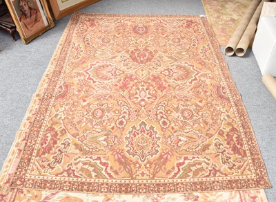 Lot 1312 - A machine made rug of geometric floral design,...