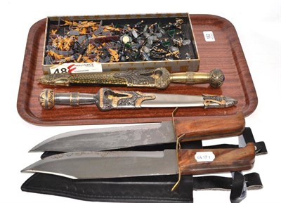 Lot 182 - A large quantity of German lead painted soldiers and four modern daggers
