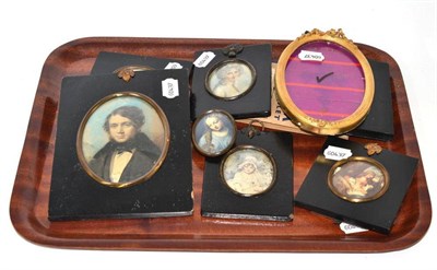 Lot 184 - A watercolour portrait miniature in ebonised frame, various other miniatures in ebonised...