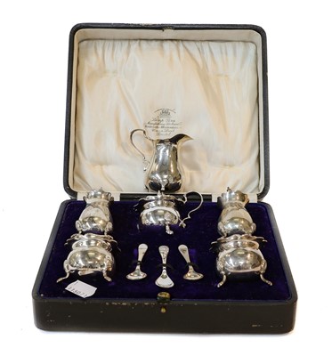 Lot 16 - A cased George V silver cruet set, Birmingham,...