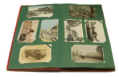 Lot 235 - Three albums containing mainly mixed...