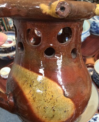 Lot 18 - A slipware puzzle jug, 18th Century pearlware...