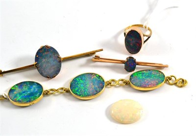 Lot 198 - Two opal triplet bar brooches, an opal triplet ring, a similar bracelet, a loose opal stone