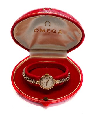 Lot 262 - A ladies 9 carat gold wristwatch, signed Omega,...
