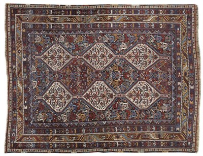 Lot 1118 - Khamseh Rug South West Persia The field with two columns of stepped ivory medallions surrounded...