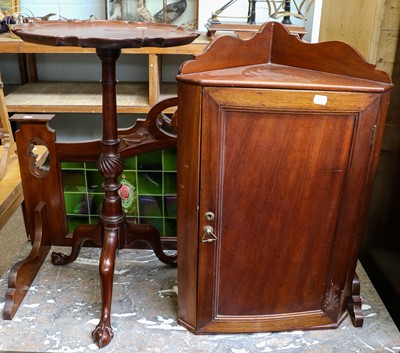 Lot 1225 - A reproduction mahogany tripod wine table with...