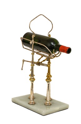 Lot 310 - A Plated Mechanical Wine Bottle Pourer, early...