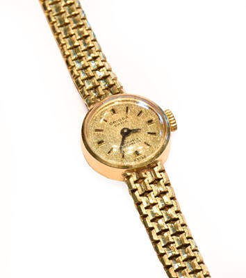 Lot 194 - A lady's 14 carat gold wristwatch, signed...
