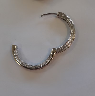 Lot 2134 - A Pair of Emerald and Diamond Hoop Earrings