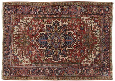 Lot 1119 - Heriz Rug of Unusual Size  Persian Azerbaijan The terracotta field of angular vines around a...