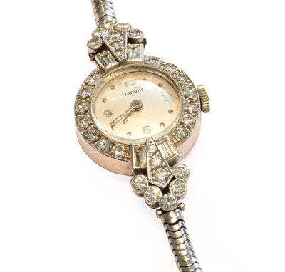 Lot 193 - A lady's diamond set platinum cocktail watch,...