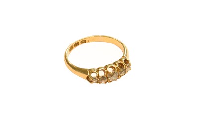 Lot 208 - An 18 carat gold diamond five stone ring,...