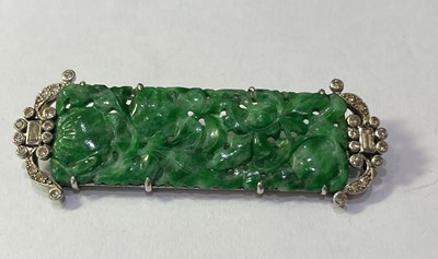 Lot 2264 - An Art Deco Jade and Diamond Brooch