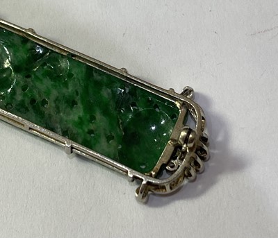 Lot 2264 - An Art Deco Jade and Diamond Brooch