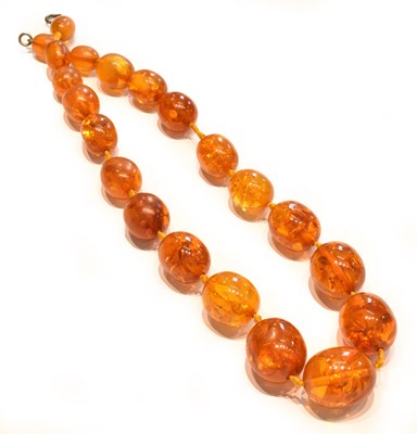 Lot 220 - An amber bead necklace, length 55cm