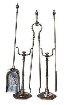 Lot 320 - A set of early 19th century steel fire irons...