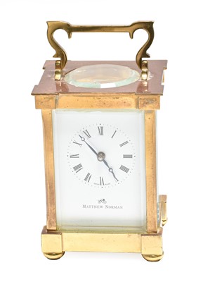 Lot 131 - A brass carriage timepiece signed Matthew Norman