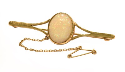 Lot 255 - An opal bar brooch, stamped '9CT', length 5.7cm