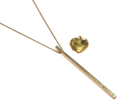 Lot 252 - A 9 carat gold diamond heart locket, length...