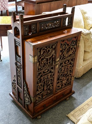 Lot 1410 - A Chinese marriage cabinet with open fret...