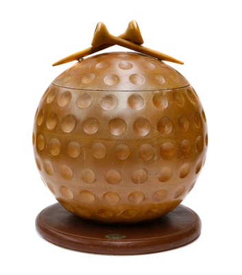 Lot 394 - Gucci, a novelty wooden ice bucket, formed as...