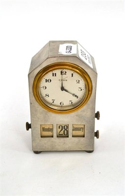 Lot 233 - A Tudric Pewter clock with perpetual calendar, retailed and stamped by Liberty & Co