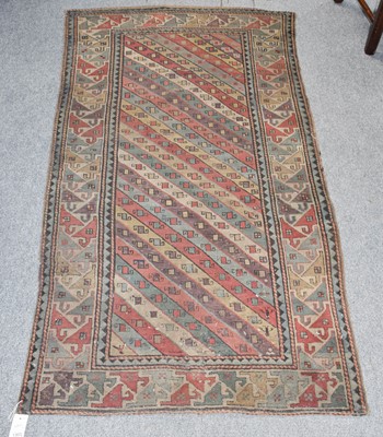 Lot 1303 - Gendje Rug, 19th century, the polychrome field...