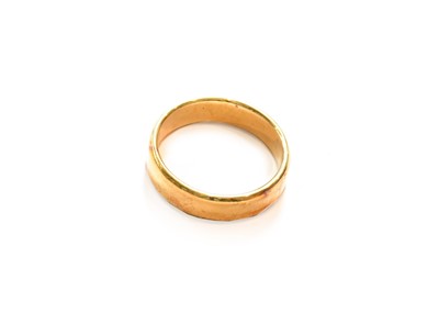 Lot 352 - An 18 carat gold band ring, finger size U