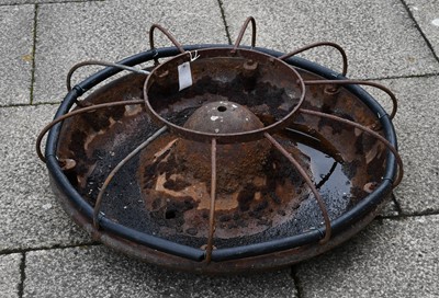 Lot 1344 - A circular cast iron Pig Trough