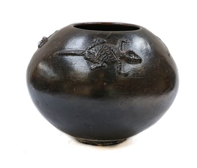 Lot 280 - A black glazed terracota jar, probably Oceanic,...