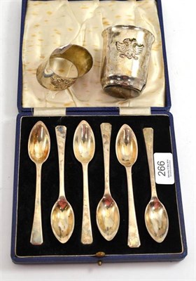Lot 266 - A set of six Elkington silver grapefruit spoons, a Continental beaker and a napkin ring stamped...