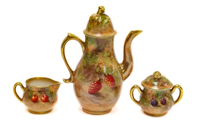 Lot 157 - A Royal Worcester miniature coffee pot and...