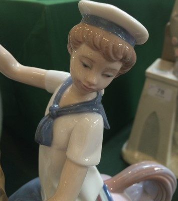 Lot 78 - A Lladro figure modelled as a sailor boy on...