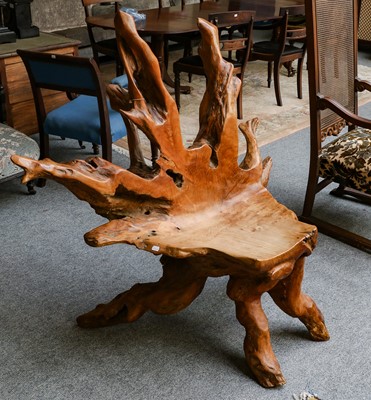 Lot 1399 - A 20th century carved yew wood chair of...