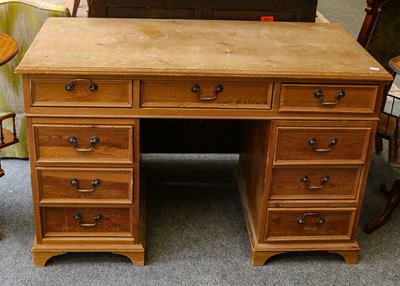 Lot 1390 - A pine twin pedestal desk, 121cm by 62cm by 78cm