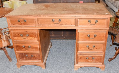 Lot 1390 - A pine twin pedestal desk, 121cm by 62cm by 78cm