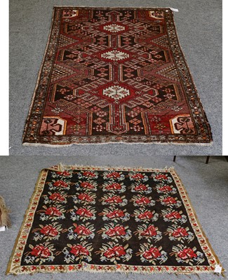 Lot 1321 - A Hamadan rug, the field with three linked...