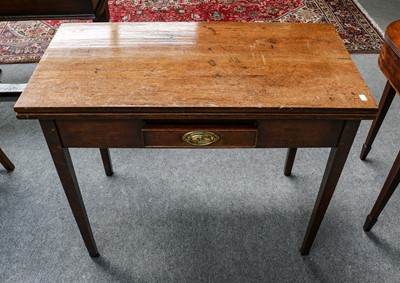 Lot 1241 - A George III oak fold-over tea table, with...