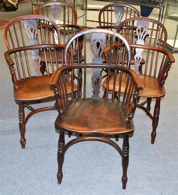 Lot 1126 - A Harlequin Set of Five 19th Century Yew and Elm Windsor Armchairs, with double spindle back...