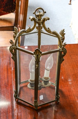 Lot 1341 - A brass hexagonal three light ceiling lantern...