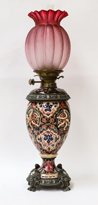 Lot 52 - A Zsolnay pottery oil lamp with brass mounts,...
