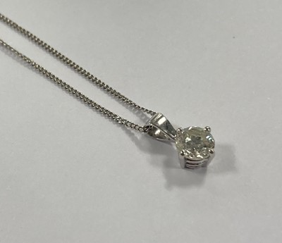 Lot 2104 - An 18 Carat White Gold Diamond Solitaire Pendant on Chain