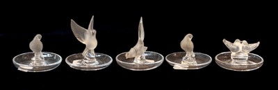 Lot 475 - Five modern Lalique pin dishes each surmounted...